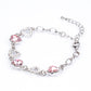 Conjunto de Aleación Bañado en Oro con Cristal Emporia® Blanco y Cristal Emporia® Rosa ( Pendientes +Pulsera )