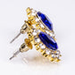 Conjunto de Aleación Bañado en Oro con Cristal Emporia® Azul y Cristal Emporia® Blanco ( Collar +Pendientes )
