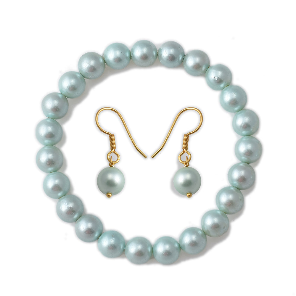 Conjunto de Plata Bañada en Oro con Perla de concha ( Pendientes +Pulsera )