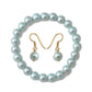 Conjunto de Plata Bañada en Oro con Perla de concha ( Pendientes +Pulsera )