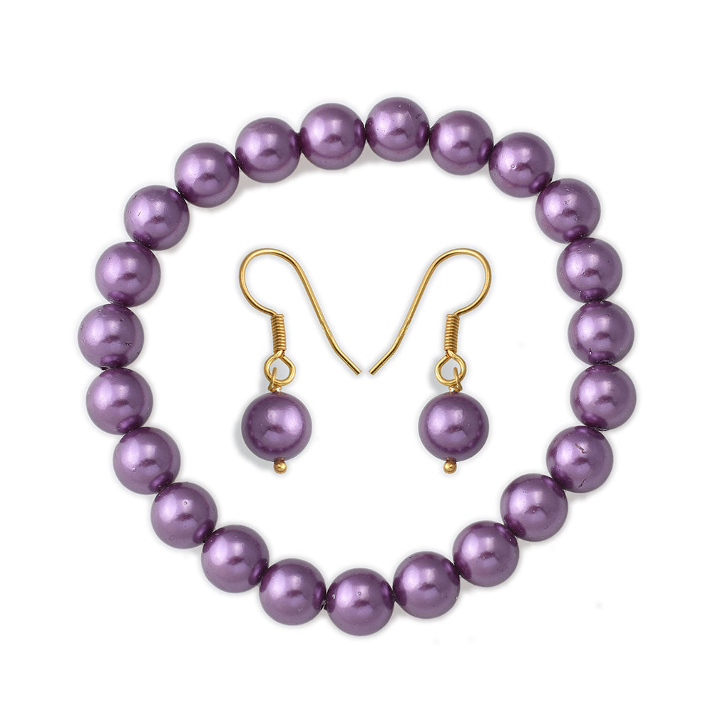 Conjunto de Plata Bañada en Oro con Perla de concha ( Pendientes +Pulsera )