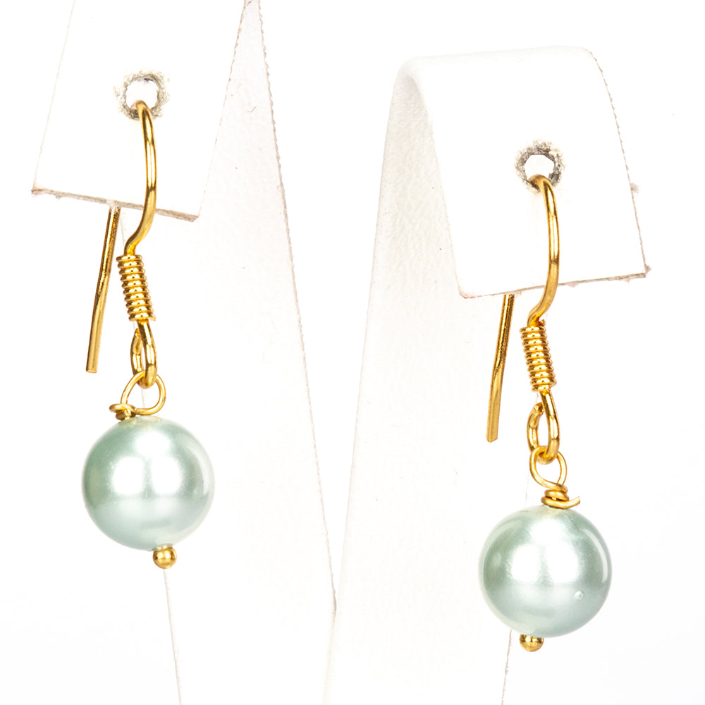 Conjunto de Plata Bañada en Oro con Perla de concha ( Pendientes +Pulsera )