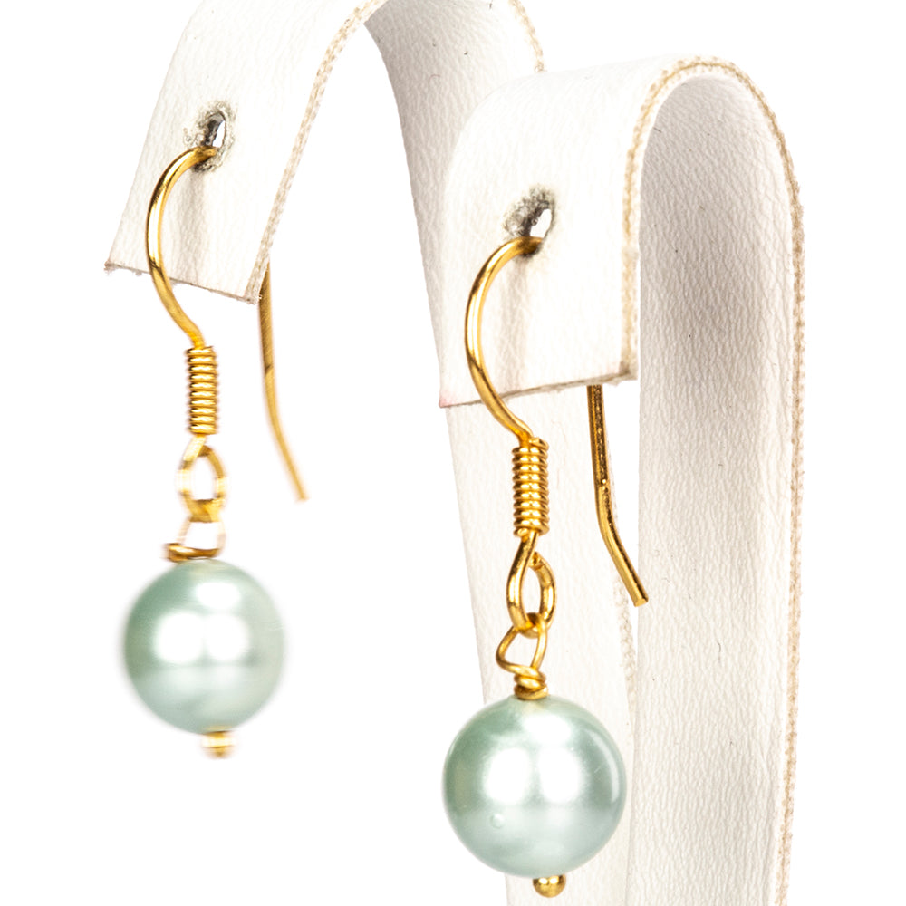 Conjunto de Plata Bañada en Oro con Perla de concha ( Pendientes +Pulsera )