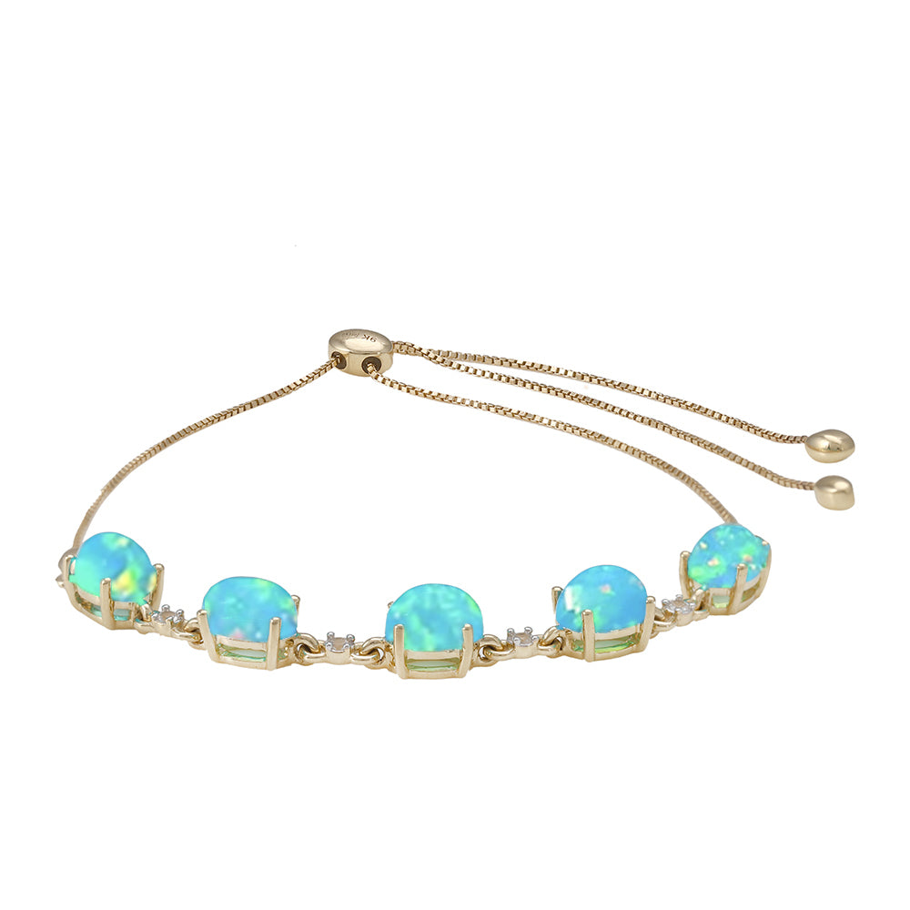 Pulsera de Oro 9K con Ópalo Azul Paraiba de Etiopía y Topacio Blanco 2 