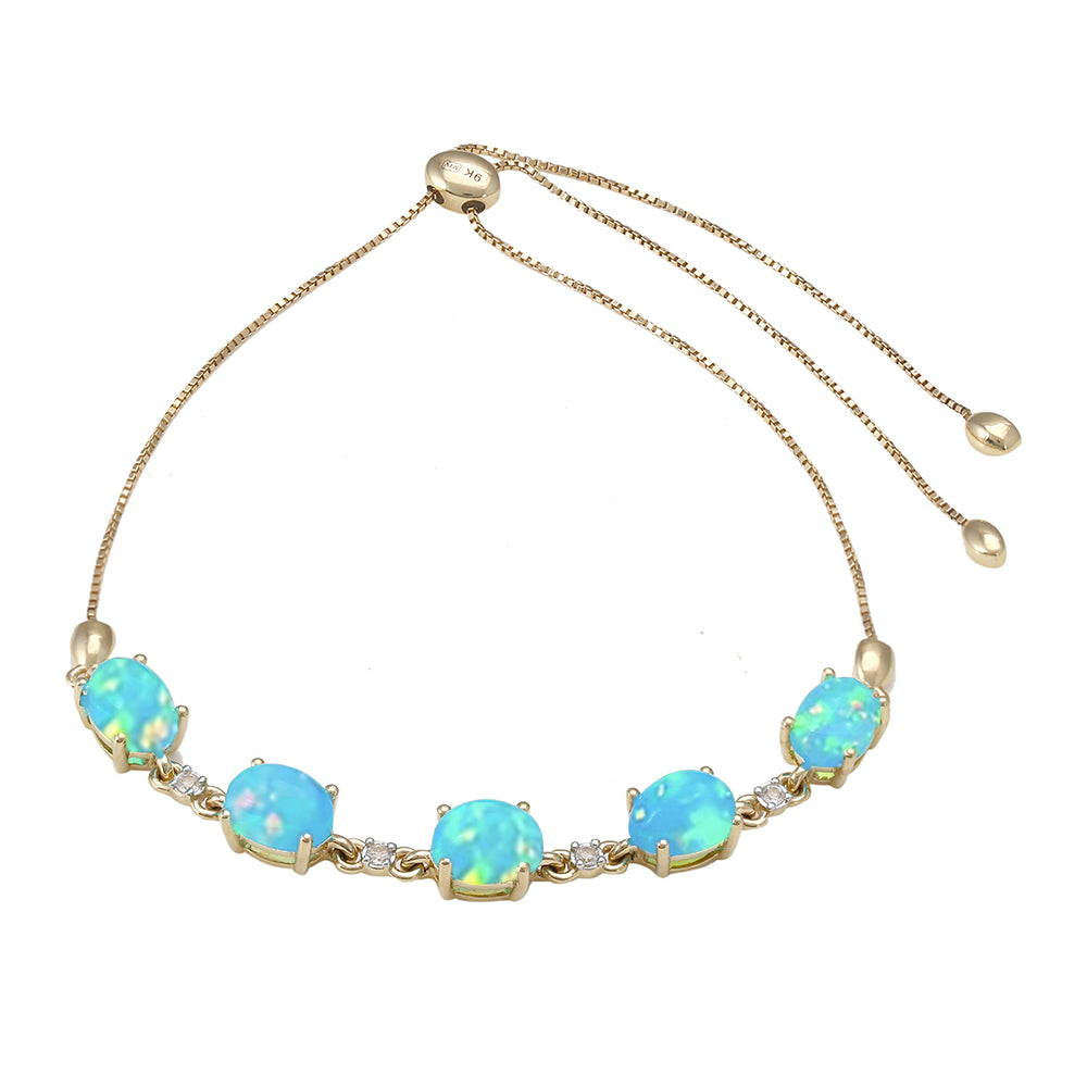 Pulsera de Oro 9K con Ópalo Azul Paraiba de Etiopía y Topacio Blanco 1 