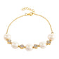 Pulsera de Plata Bañada en Oro con Perla Barroca Cultivada de Agua Dulce y Topacio Blanco