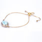 Pulsera de Plata Bañada en Oro con Larimar y Zircón natural