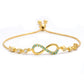 Pulsera de Plata Bañada en Oro con Esmeralda de Brasil y Topacio Blanco
