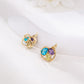 Conjunto de Aleación Bañado en Oro con Cristal Emporia® Azul y Cristal Emporia® Blanco ( Pendientes +Colgante )