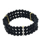 Pulsera de Plata Bañada en Oro con Ónix Negro y Topacio Blanco