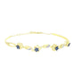 Brazalete de Plata Bañada en Oro con Diamante Azul y Topacio Blanco