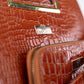 Colección Emporia de invierno 2023 -Genuina, set de 2 piezas de bolsos, color coñac