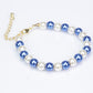 Conjunto de Aleación Bañado en Oro con Perla Blanca y Cristal Emporia® Azul ( Collar +Pendientes +Pulsera )